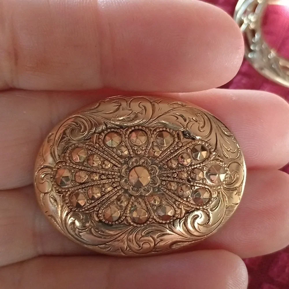 Three vintage brooches